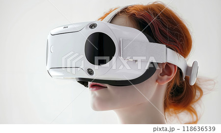 A woman wearing a virtual reality headset A woman wearing a virtual reality headset 118636539