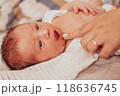 The examination of newborn baby mouth, frenulum of the tongue 118636745