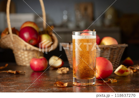 Apple cider on an old kitchen table. 118637270
