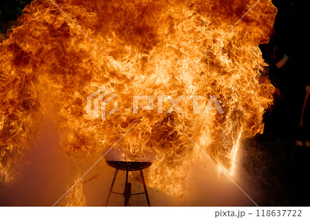 Intense Fire Explosion. An intense fire explosion captured in detail, revealing the ferocity and motion of the flame 118637722