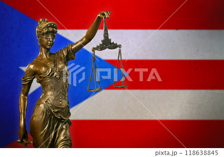 Lady Justice before a flag of Puerto Rico 118638845