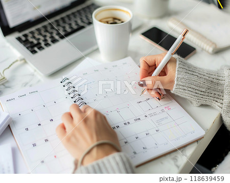 Person using a calendar to organize weekly activities, high resolution, balanced productivity, Person using a calendar to organize weekly activities, high resolution, balanced productivity, 118639459