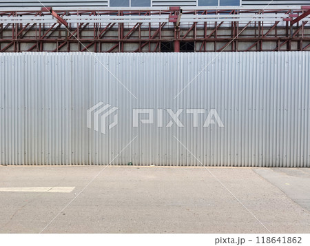 Corrugated galvanized fence, grunge gray metal texture, aluminum wall panel. Corrugated galvanized fence, grunge gray metal texture, aluminum wall panel. 118641862