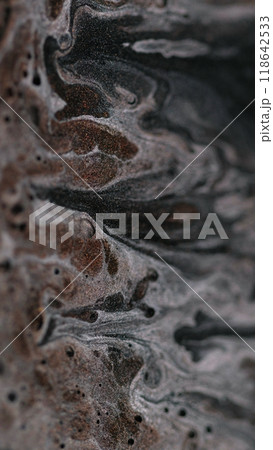 Glitter texture. Gel flow. Sparkling silver liquid bubbles shimmering particles glowing abstract emulsion color mixing art background glitter. 118642533