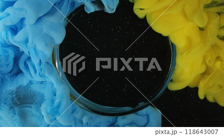 Smoke flow. Color water. Glass round frame starry galaxy portal yellow blue mist blend abstract spill shiny spark background free space . 118643007