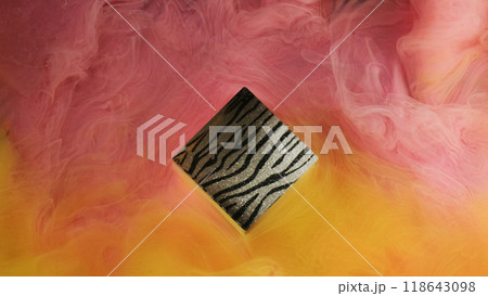 Mystic fog. Paint water. Pastel pink yellow color swirling smoke mixing around shiny geometric square shape zebra stripes texture abstract background. 118643098