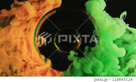 Neon smoke. Ink water. Orange green color mist blend time travel galaxy portal golden sphere fog flow frame starry shiny abstract background. Neon smoke. Ink water. Orange green color mist blend time travel galaxy portal golden sphere fog flow frame starry shiny abstract background. 118643124