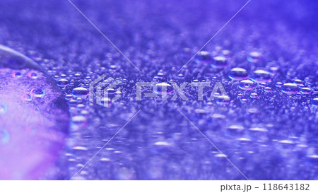 Gel fluid. Droplet floating. Defocused purple color glitter translucent acid liquid texture ink water blob abstract art background. 118643182