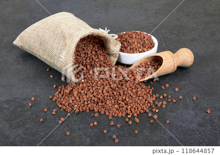 Raw buckwheat on black Raw buckwheat on black 118644857