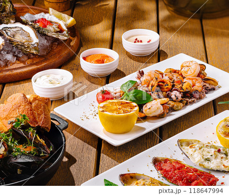 Gourmet mediterranean feast on rustic wooden table 118647994