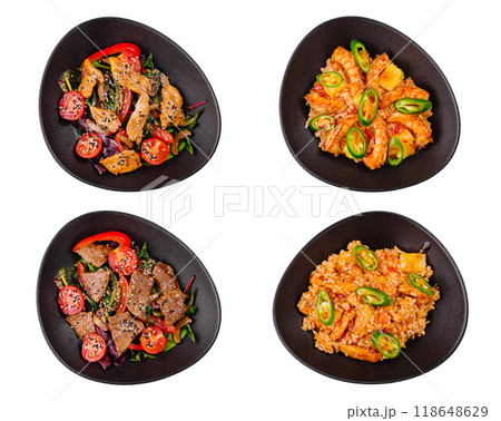 Four asian dishes with rice, chicken, beef and shrimps in black bowls 118648629