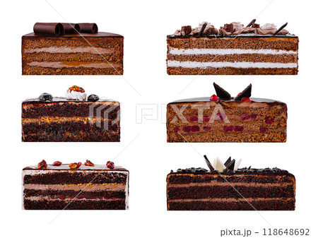 Delicious chocolate cake slices with various toppings isolated on white background 118648692