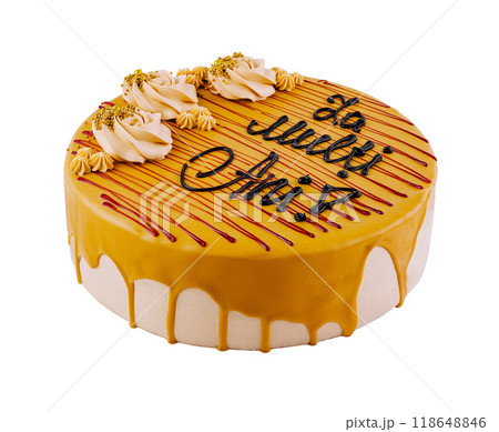 Delicious birthday cake with yellow icing dripping and chocolate writing on white background 118648846