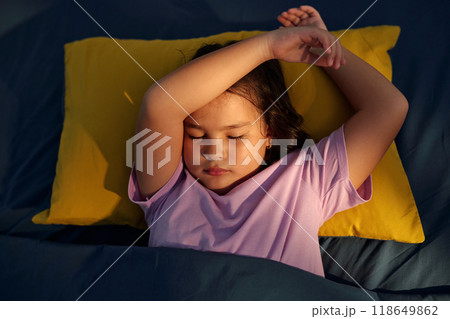 Little Girl Sleeping In Her Bed 118649862