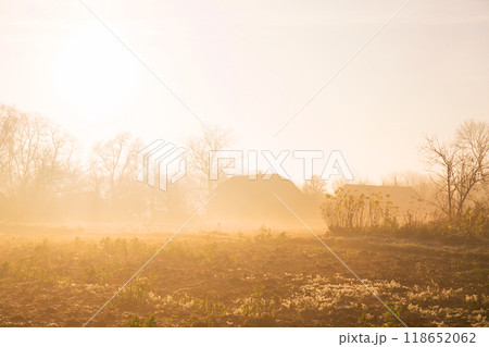 Foggy sunny autumn morning in the countryside Foggy sunny autumn morning in the countryside 118652062