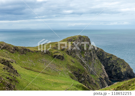 Beautiful rocky cliff near Slieve League, Ireland, with a mix of natural colors from the sky, sea 118652255