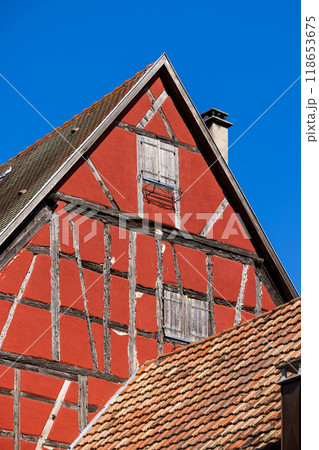 Old half-timbered house in the historic medieval old town of Eguisheim in Alsace and on Alsace Wine Route, Haut-Rhin, Grand Est, France, Europe 118653675
