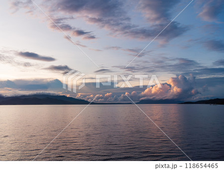 panoramic aerial view of sunrise over the sea and mountains with clouds panoramic aerial view of sunrise over the sea and mountains with clouds 118654465