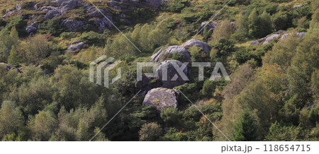 Round boulder seen from Lauvnesfjell, Norway. 118654715