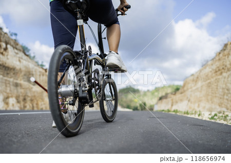 low angle view cyclist athlete riding bike 118656974