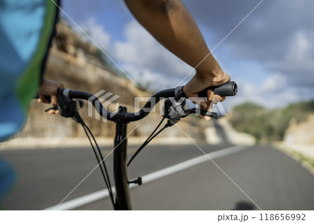 biker hand on handle bar close up 118656992