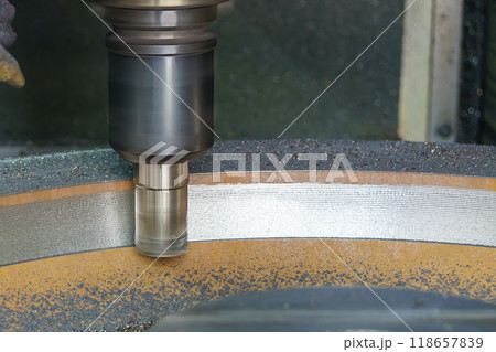 The CNC milling machine rough cutting cast iron parts by indexable tools. The CNC milling machine rough cutting cast iron parts by indexable tools. 118657839