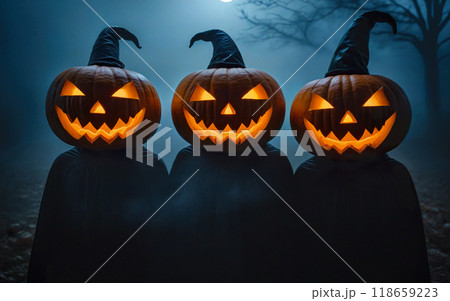 halloween concept, people in festive costumes for halloween holiday, glowing pumpkin head on mystical foggy background 118659223