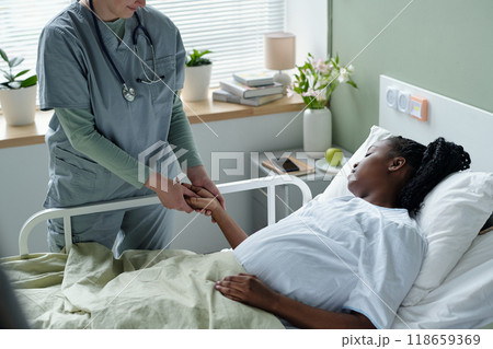 Nurse Supporting Patient in Hospital Setting Nurse Supporting Patient in Hospital Setting 118659369