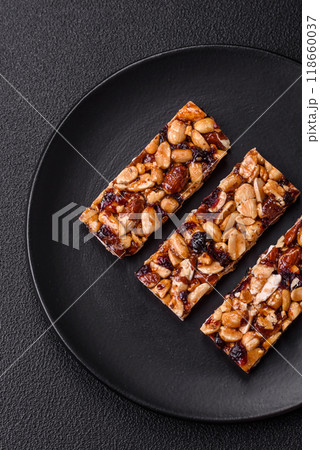 Delicious sweet nutrition bars with nuts, dried berries gluten free Delicious sweet nutrition bars with nuts, dried berries gluten free 118660037