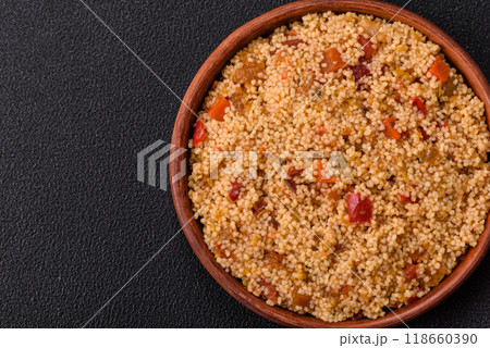 Delicious hot boiled wheat porridge couscous with vegetables Delicious hot boiled wheat porridge couscous with vegetables 118660390