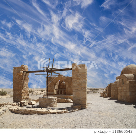 Quseir (Qasr) Amra desert castle (against the sky with clouds) near Amman, Jordan. World heritage with famous fresco's. Built in 8th century,  of early Islamic art and architecture 118660542