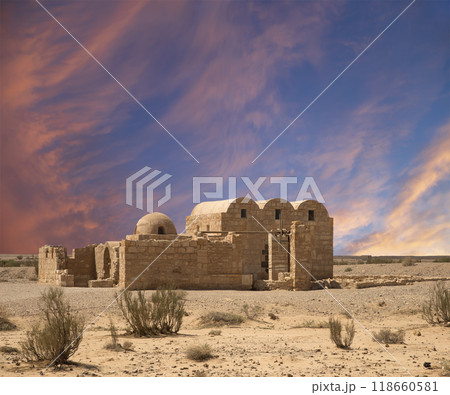 Quseir (Qasr) Amra desert castle (against the sky with clouds) near Amman, Jordan. World heritage with famous fresco's. Built in 8th century,  of early Islamic art and architecture 118660581