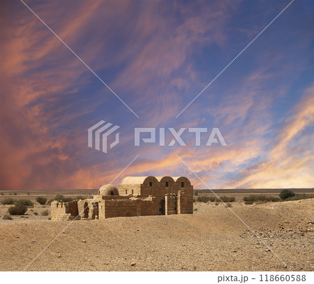 Quseir (Qasr) Amra desert castle (against the sky with clouds) near Amman, Jordan. World heritage with famous fresco's. Built in 8th century,  of early Islamic art and architecture 118660588