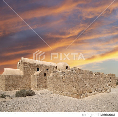 Quseir (Qasr) Amra desert castle (against the sky with clouds) near Amman, Jordan. World heritage with famous fresco's. Built in 8th century,  of early Islamic art and architecture 118660608