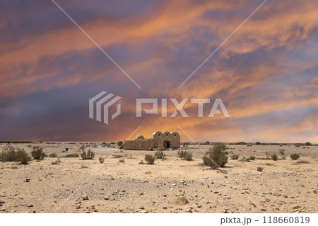 Quseir (Qasr) Amra desert castle (against the sky with clouds) near Amman, Jordan. World heritage with famous fresco's. Built in 8th century,  of early Islamic art and architecture 118660819