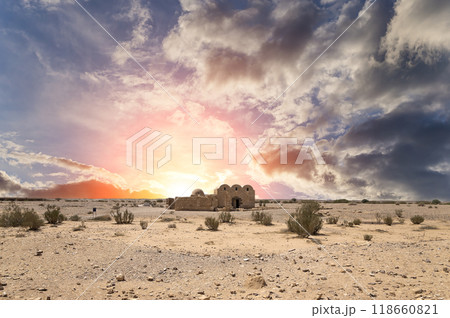 Quseir (Qasr) Amra desert castle (against the sky with clouds) near Amman, Jordan. World heritage with famous fresco's. Built in 8th century, of early Islamic art and architecture Quseir (Qasr) Amra desert castle (against the sky with clouds) near Amman, Jordan. World heritage with famous fresco's. Built in 8th century, of early Islamic art and architecture 118660821