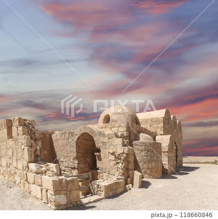 Quseir (Qasr) Amra desert castle (against the sky with clouds) near Amman, Jordan. World heritage with famous fresco's. Built in 8th century, of early Islamic art and architecture Quseir (Qasr) Amra desert castle (against the sky with clouds) near Amman, Jordan. World heritage with famous fresco's. Built in 8th century, of early Islamic art and architecture 118660846