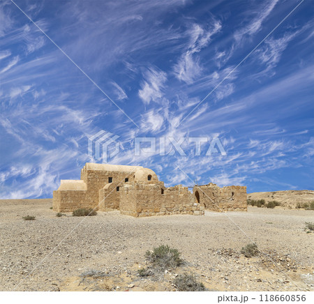 Quseir (Qasr) Amra desert castle (against the sky with clouds) near Amman, Jordan. World heritage with famous fresco's. Built in 8th century,  of early Islamic art and architecture 118660856