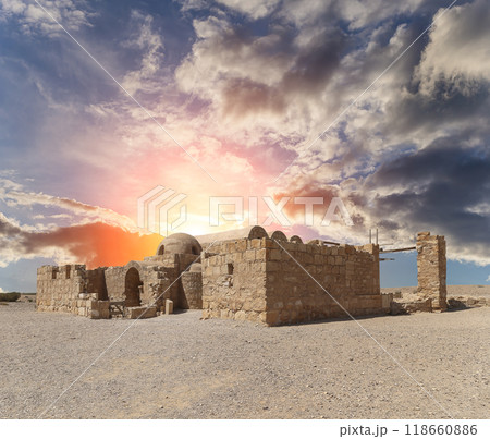 Quseir (Qasr) Amra desert castle (against the sky with clouds) near Amman, Jordan. World heritage with famous fresco's. Built in 8th century,  of early Islamic art and architecture 118660886