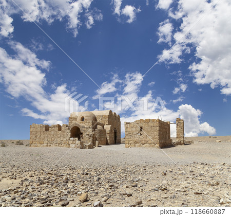 Quseir (Qasr) Amra desert castle (against the sky with clouds) near Amman, Jordan. World heritage with famous fresco's. Built in 8th century,  of early Islamic art and architecture 118660887