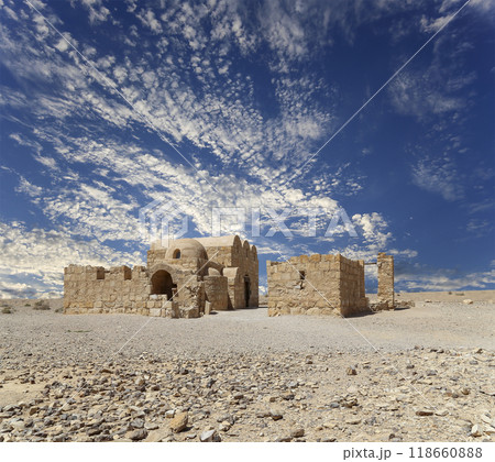 Quseir (Qasr) Amra desert castle (against the sky with clouds) near Amman, Jordan. World heritage with famous fresco's. Built in 8th century,  of early Islamic art and architecture 118660888