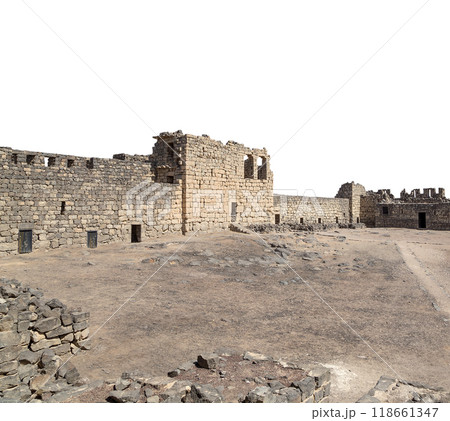 Ruins of Azraq Castle (Qasr al-Azraq) is a crusader castle (300AD),  central-eastern Jordan, 100 km east of Amman, Jordan. On white background 118661347