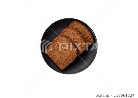 Fresh crispy brown bread sliced from whole grain flour 118661524