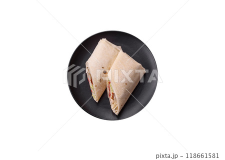 Delicious traditional shawarma or doner kebab with chicken Delicious traditional shawarma or doner kebab with chicken 118661581