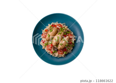 Fish or meat quenelles with vegetables, salt and spices in mushroom sauce 118661622