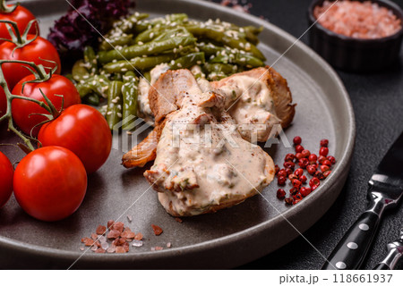 Asian food baked chicken breast with green beans, sesame seeds and sauce 118661937