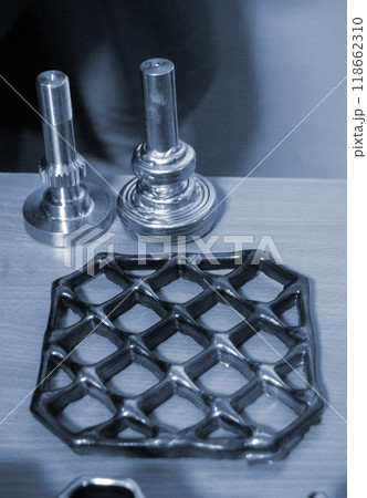 Object printed by 3D printer from metal. Additive manufacturing solution. Object created on 3Dprinter from melting metal thread. 3D Metal Printing. Metal additive manufacturing 118662310