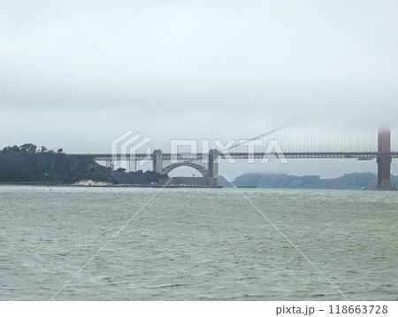 View of the Golden Gate Bridge in San Francisco, USA on a cloudy foggy day View of the Golden Gate Bridge in San Francisco, USA on a cloudy foggy day 118663728