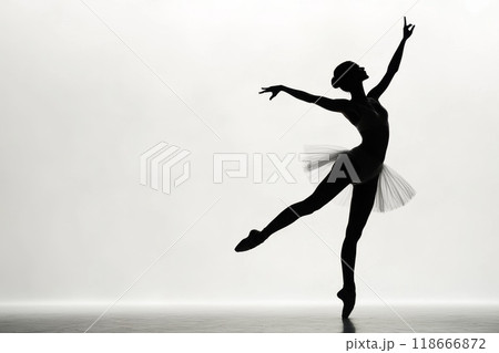 Ballerina is dancing gracefully wearing white tutu dress Ballerina is dancing gracefully wearing white tutu dress 118666872