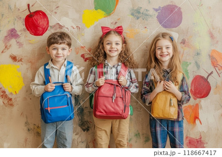 Group of elementary students smiling and wearing backpacks 118667417